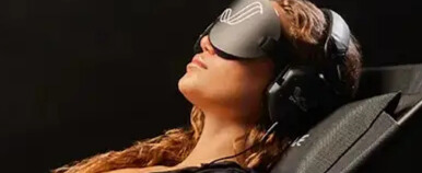 shiftwave pro device worn by a woman as she rests.